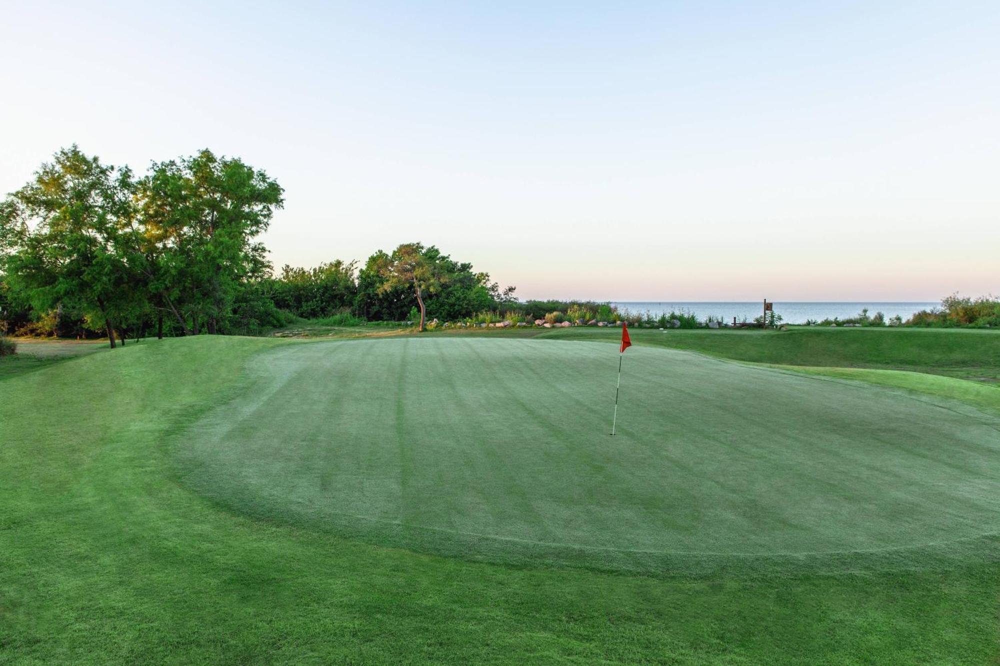 Sheraton Colonia Golf And Spa Resort Colonia del Sacramento Esterno foto The 18th green at the 2015 PGA Championship